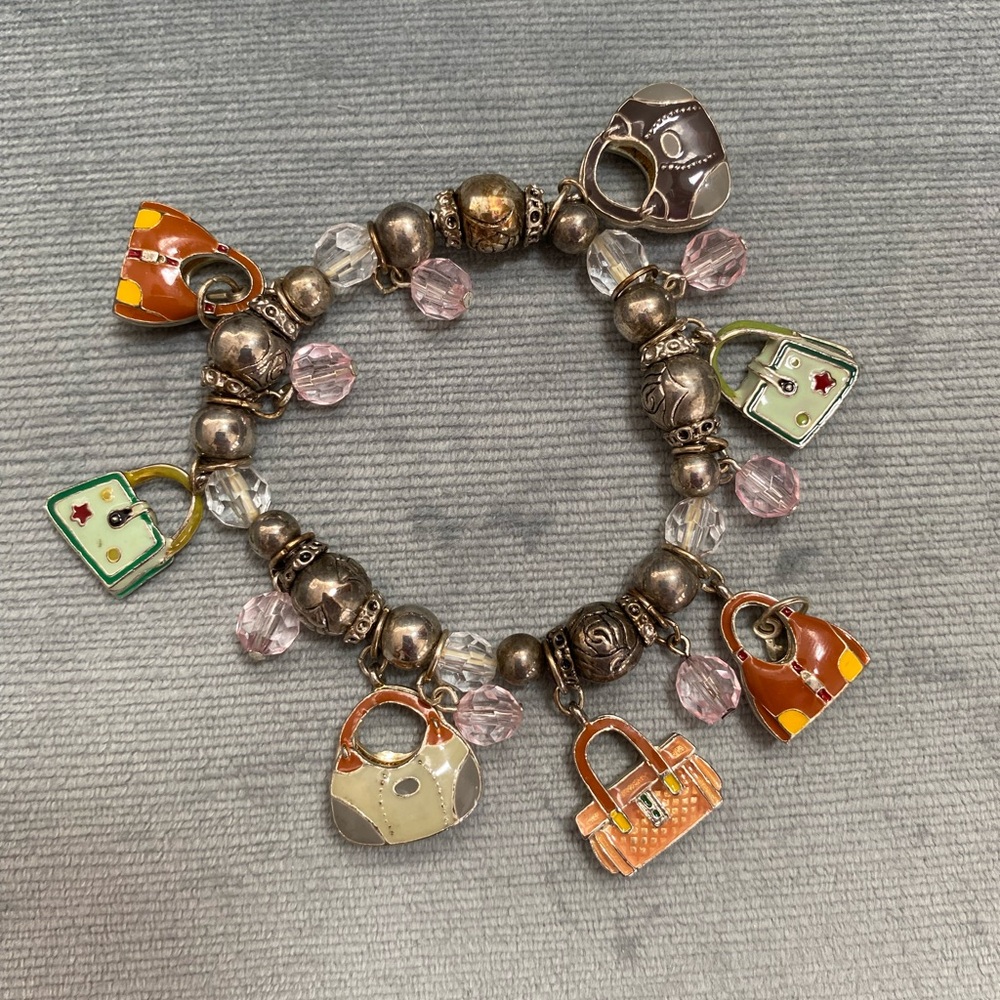 EUC all silver metal purse dangle charm bracelet 2.5 x 2.5“ stretches bigger